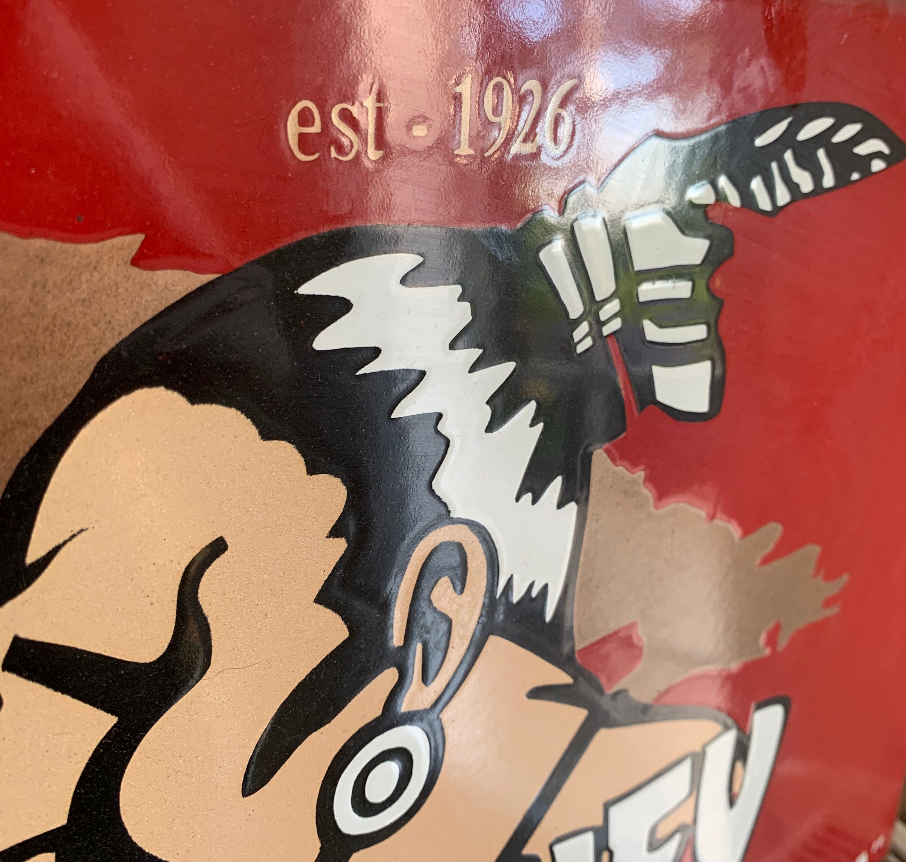 Enamelled advertising plate