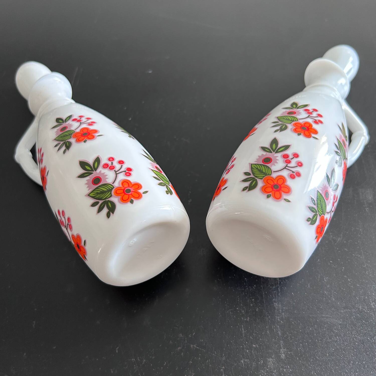Pair of floral-decorated bottles
