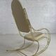 60s rocking chair in brass and ecru faux leather