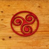 Triskelion cast iron trivet