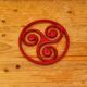 Triskelion cast iron trivet