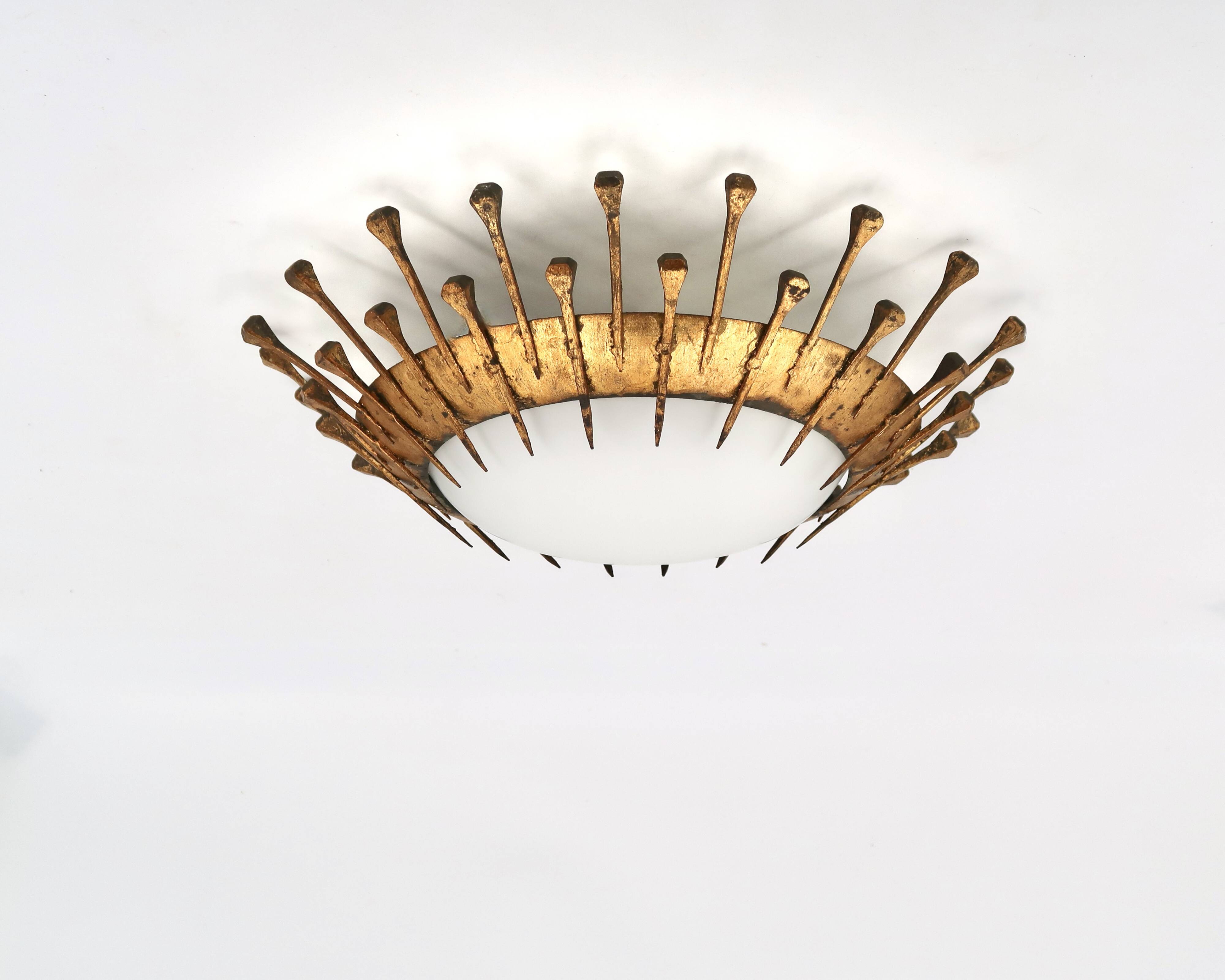 Ceiling light with forged gold nails and opaque white glass, 1950s.