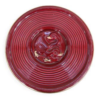 Vintage burgundy duck trivet with gold edging