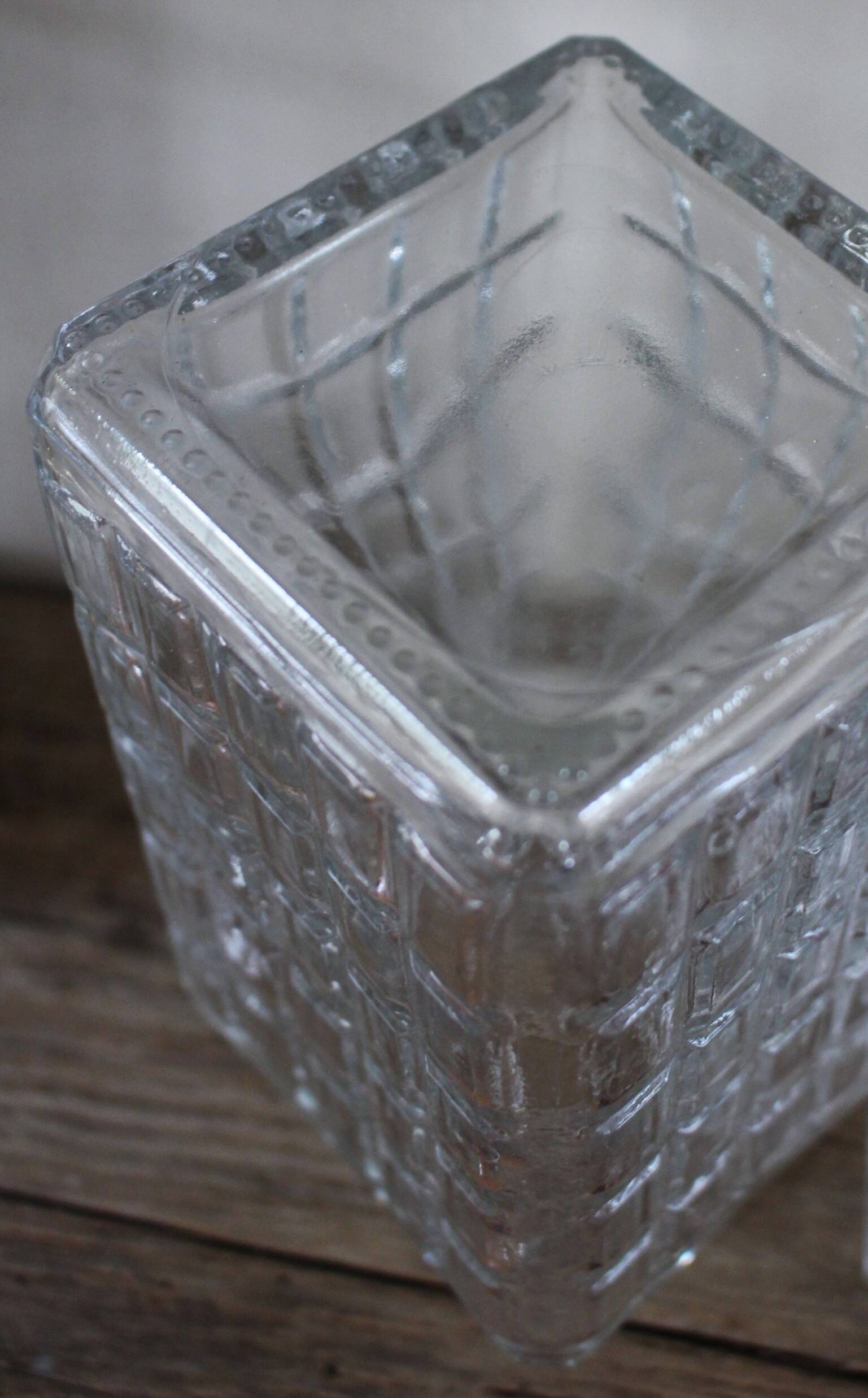 Vintage glass water carafe with rectangular vase.