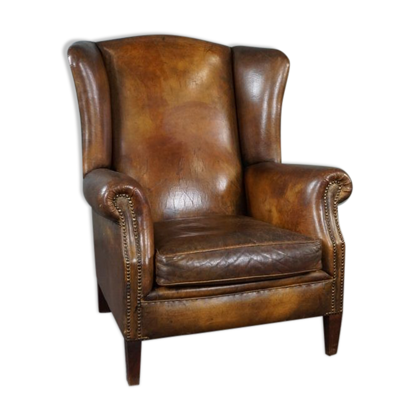 Patinated sheepskin armchair