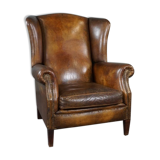 Patinated sheepskin armchair