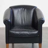 Black cowhide club chair in English style with a great luxurious design