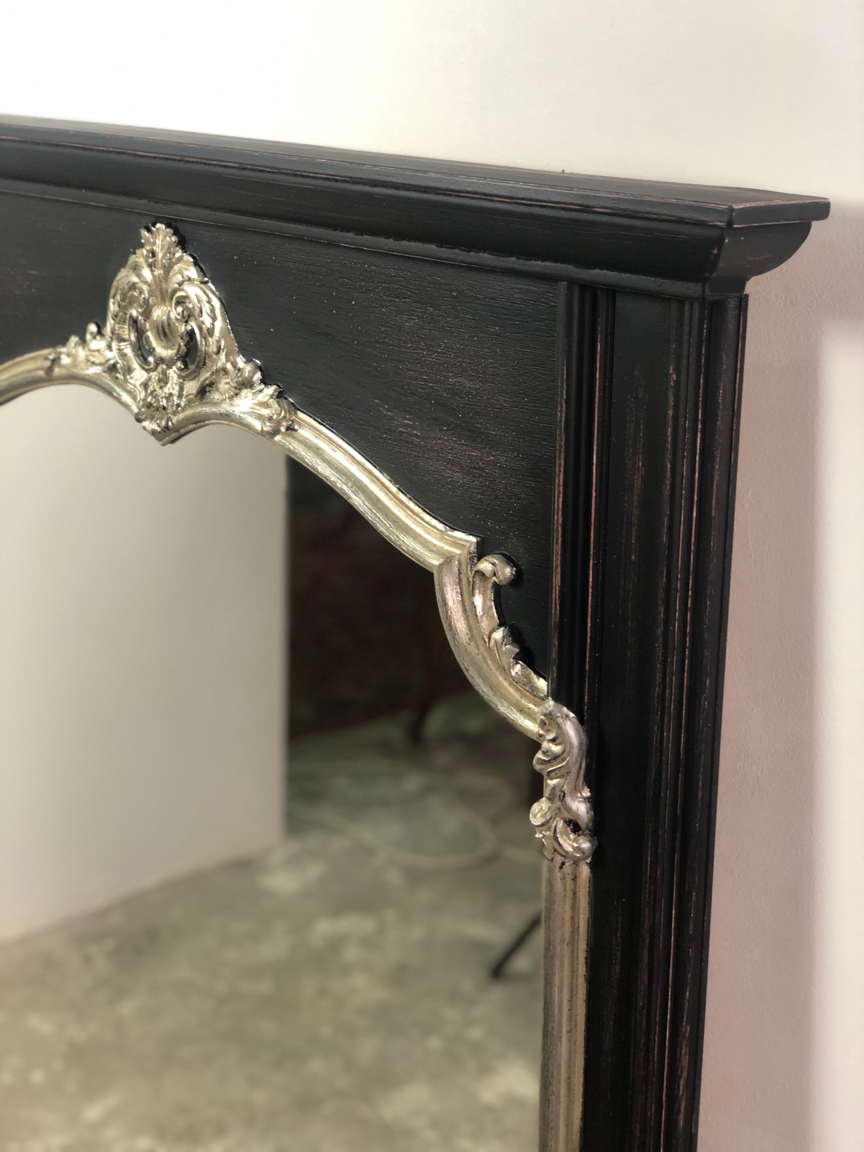 Trumeau mirror in black and silver patinated wood in Louis XV style