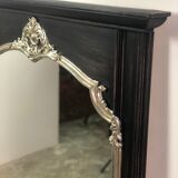 Trumeau mirror in black and silver patinated wood in Louis XV style