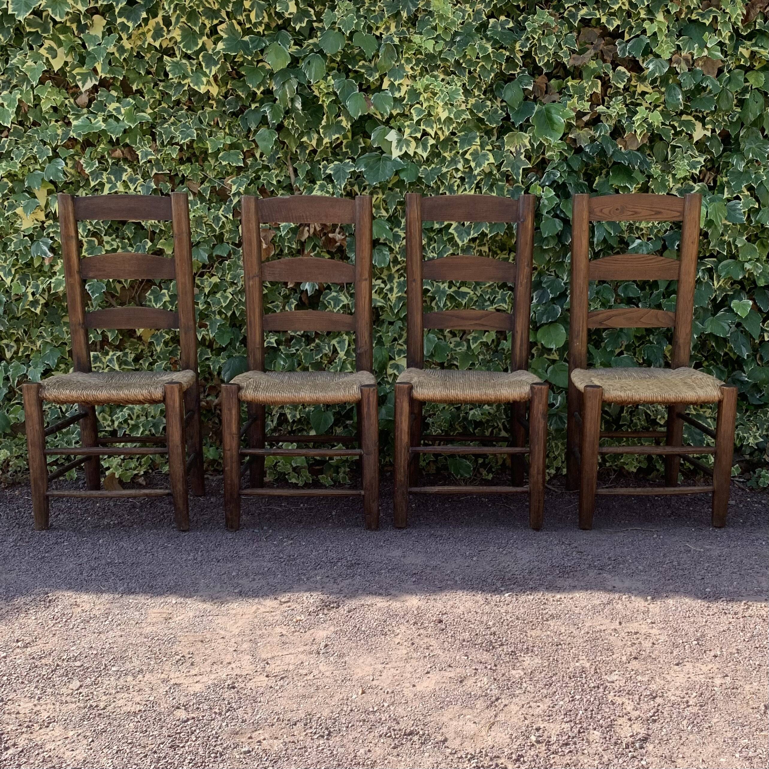 Set of 4 handcrafted rush chairs in solid oak.
