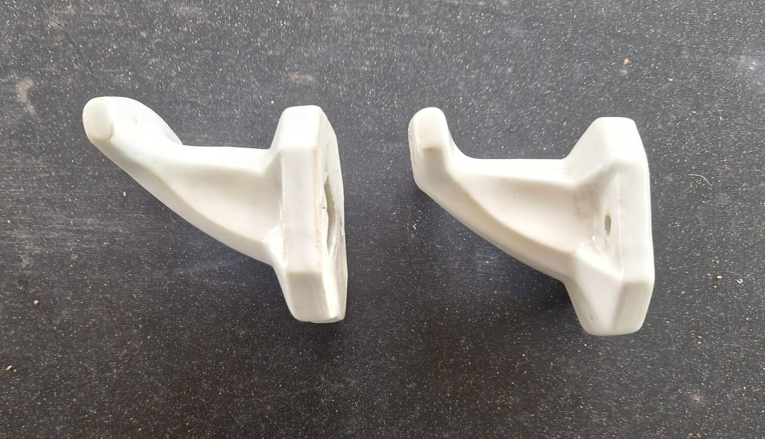 Pair of porcelain hooks
