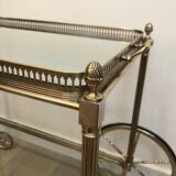 Neoclassical style rolling table in silvered brass
