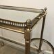 Neoclassical style rolling table in silvered brass