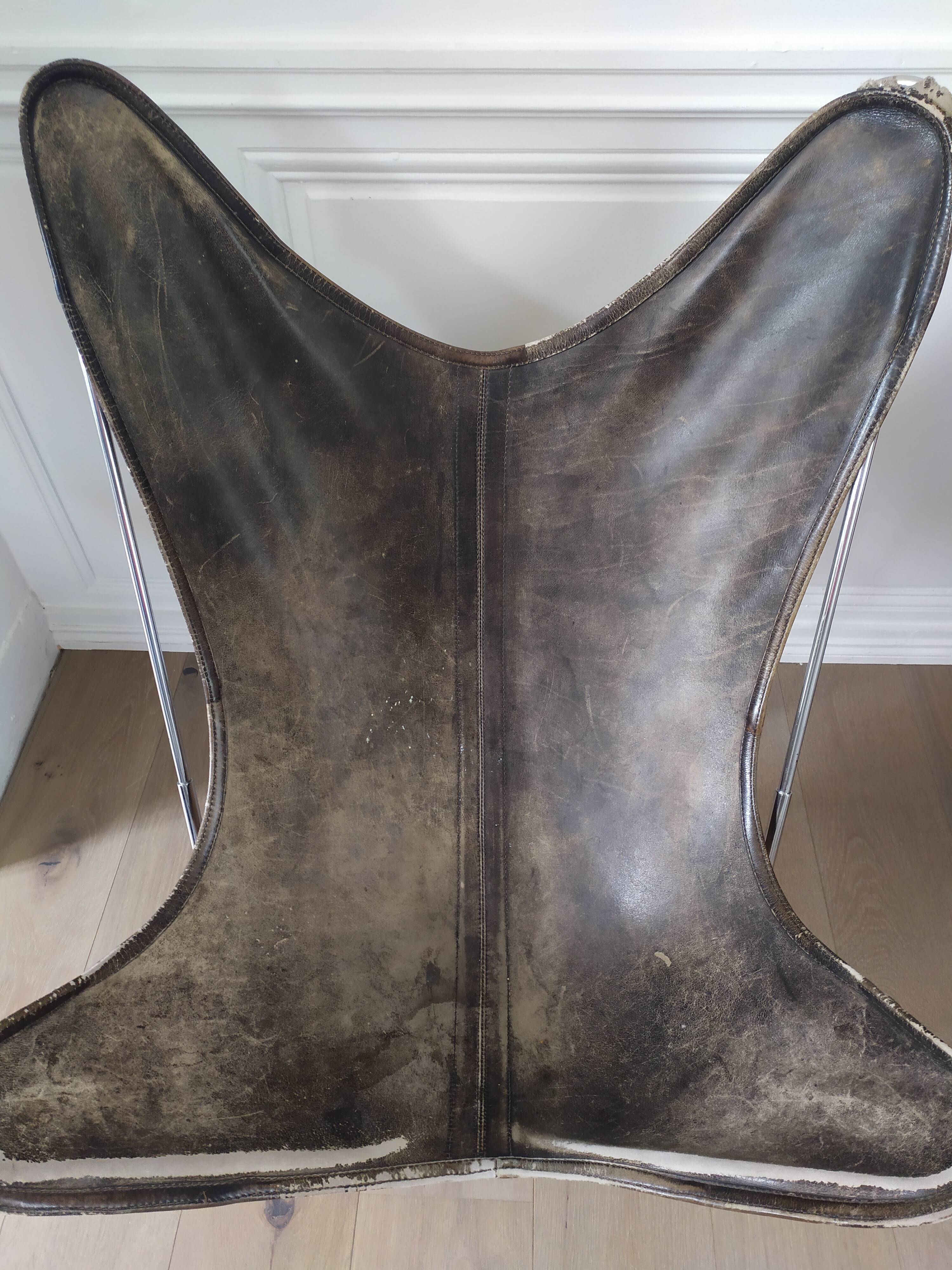 AA Butterfly leather armchairs