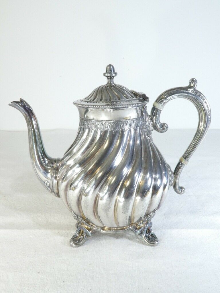 Silver flat silver metal teapot