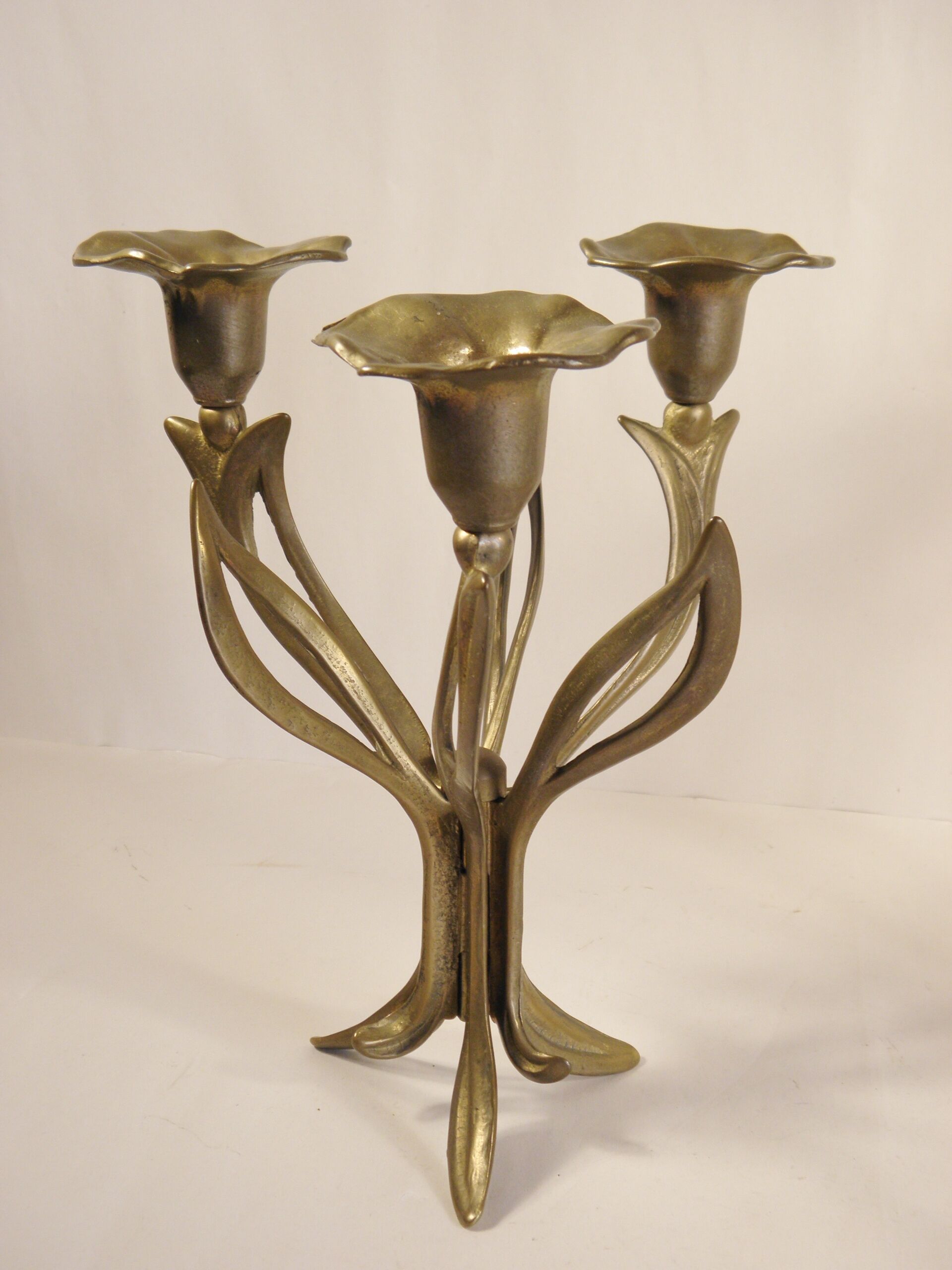 Pair of candlesticks three fires in brass