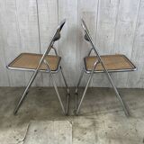 Pair of chrome and cane folding chairs