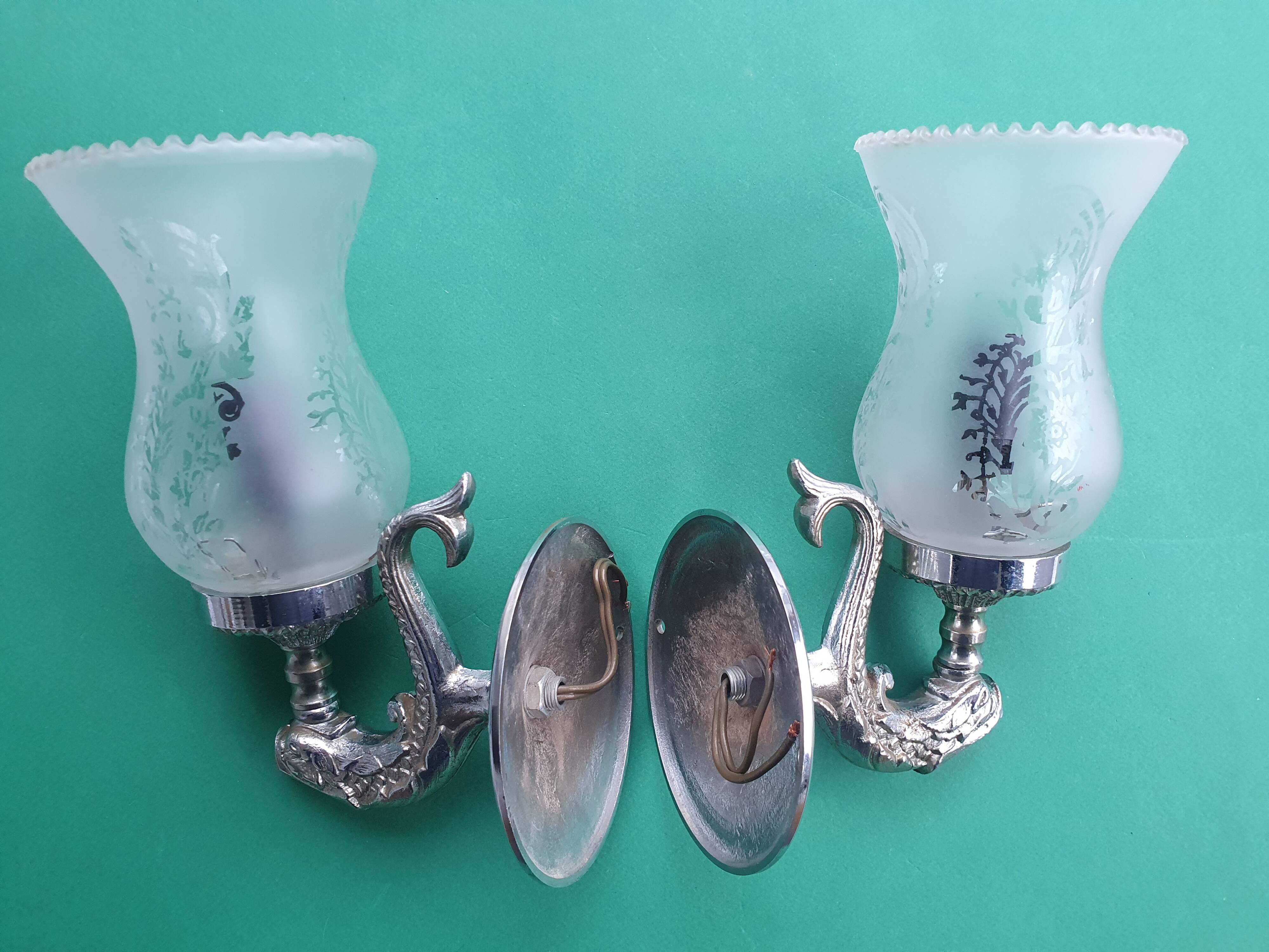 Pair of vintage chrome wall sconces