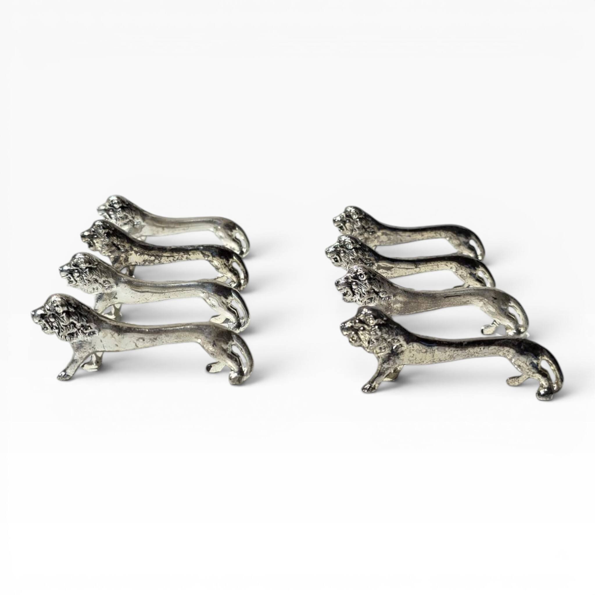 Series of antique knife rests in the shape of a lion, silver-plated metal.