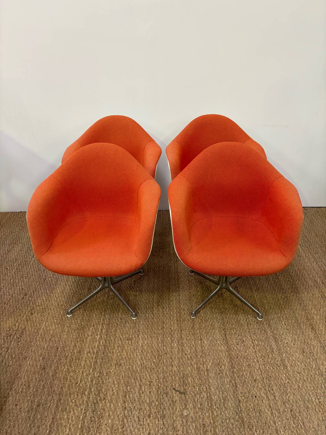 Set of 6 Eams armchairs in Hermann Miller orange fiber shell