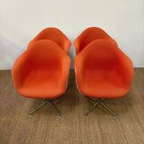 Set of 6 Eams armchairs in Hermann Miller orange fiber shell