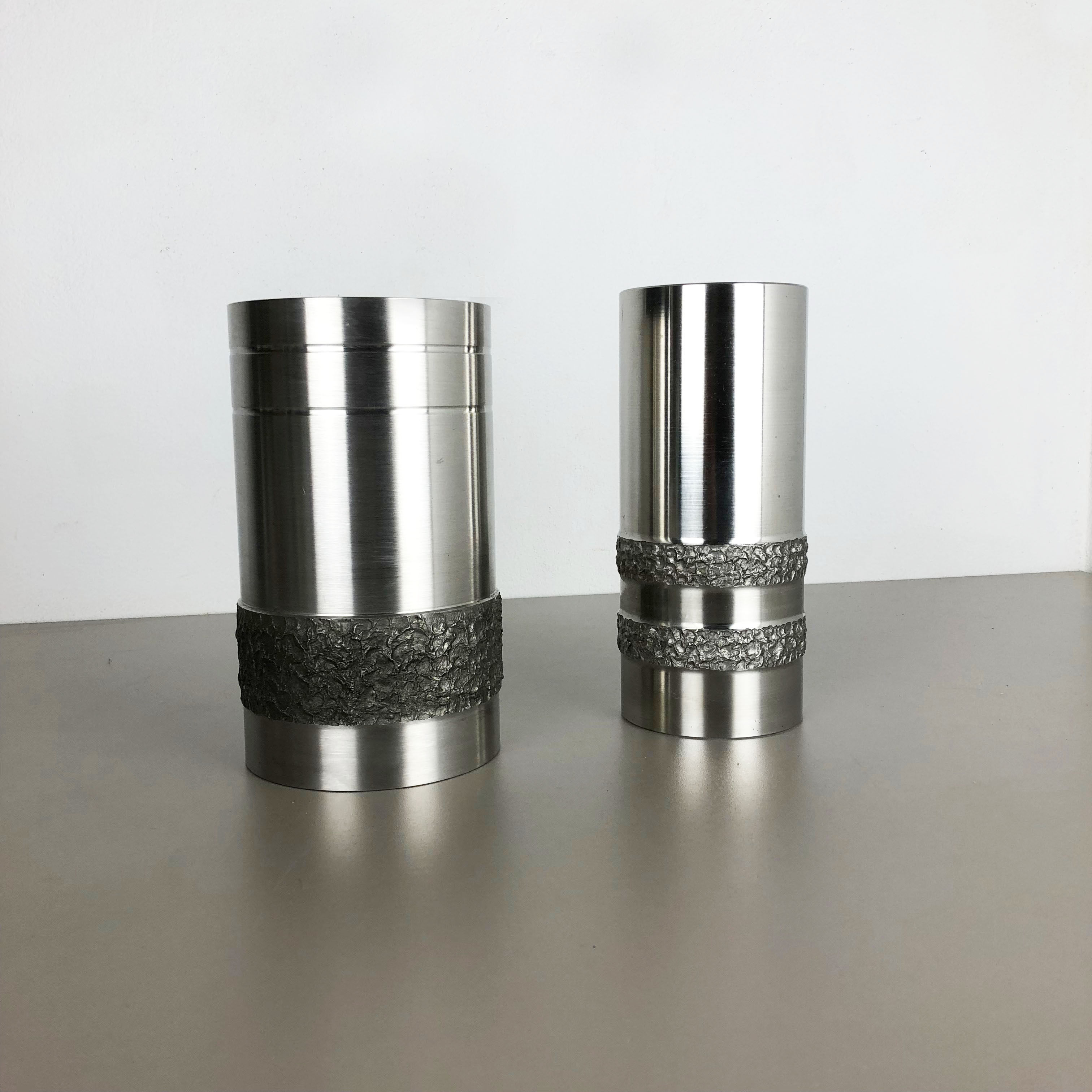Set of 2 modernist vintage sculptural brutalist steel vases, Germany 1970s
