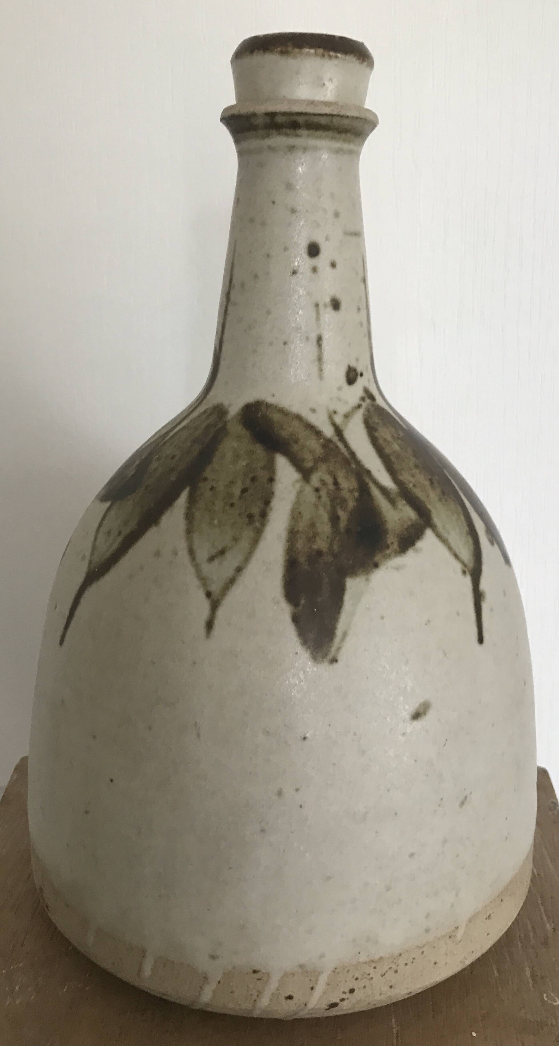 BOTTLE Vintage bottle in partially glazed pyrite stoneware