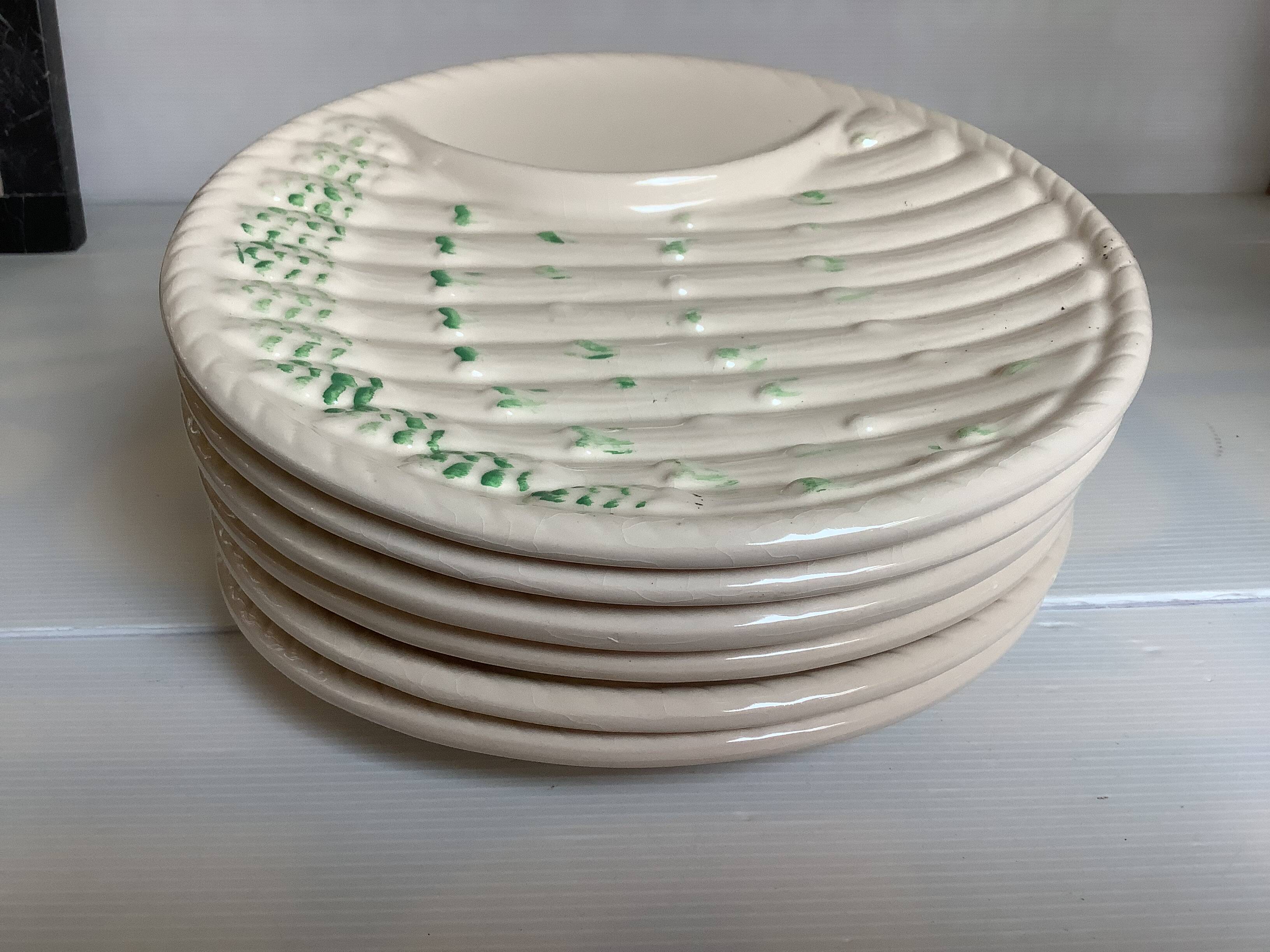 Six antique asparagus plates