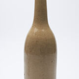 bottle in glazed and cracked sandstone