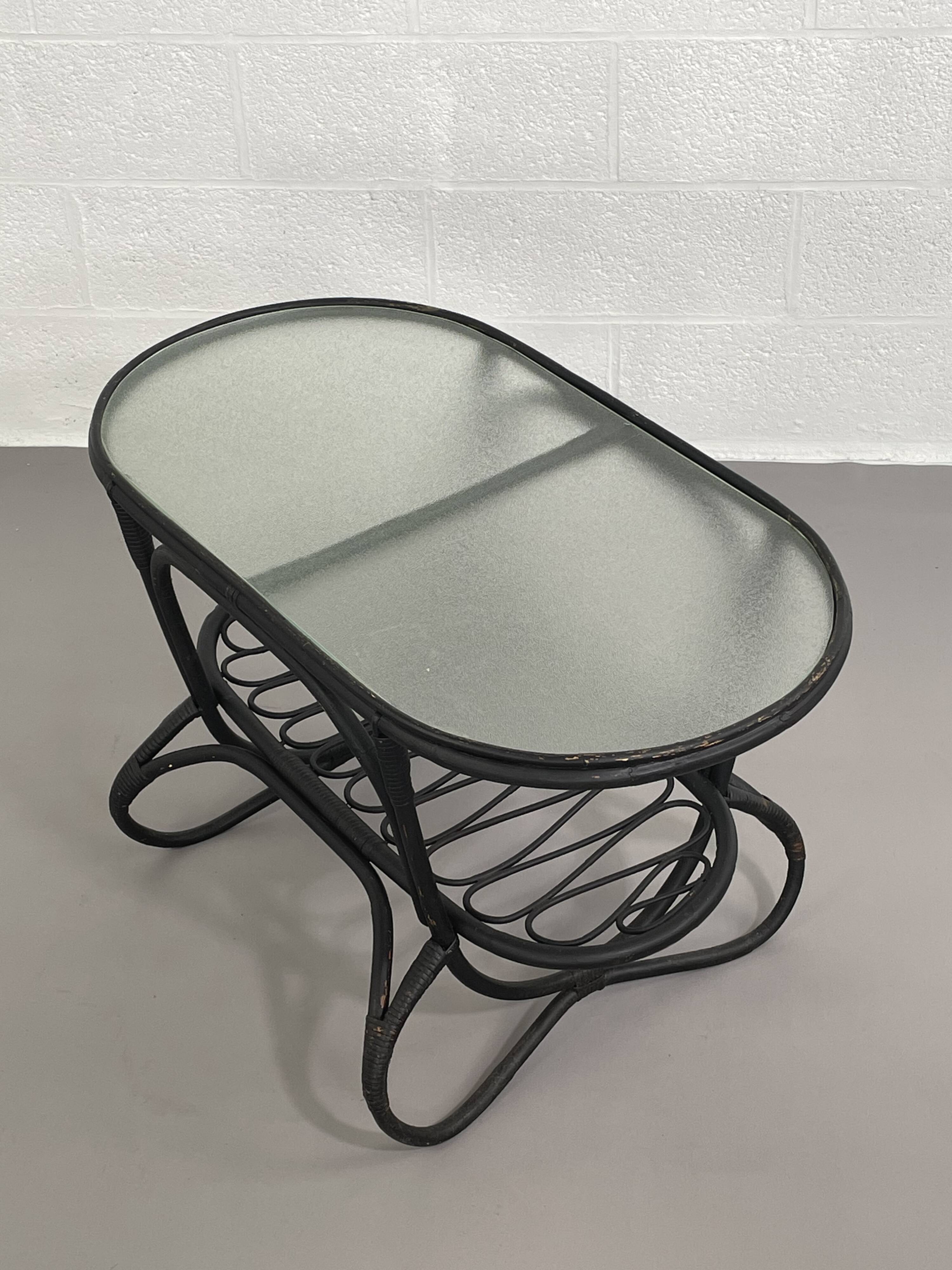 Black rattan and glass coffee table