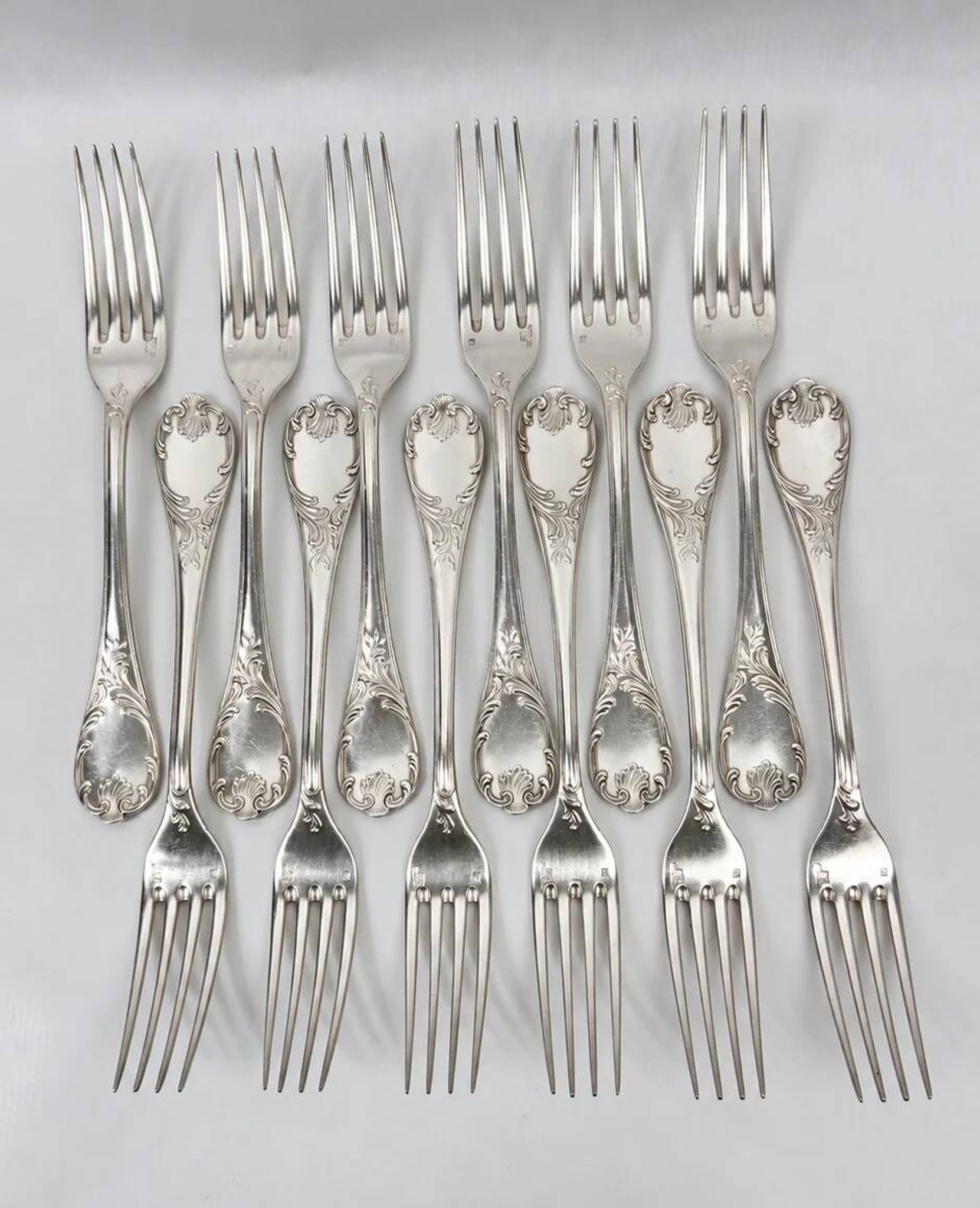 Twelve large table forks Christofle Marly, silver-plated metal.