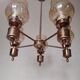 Chandelier in gilded brass and brown smoked glass with 5 branches