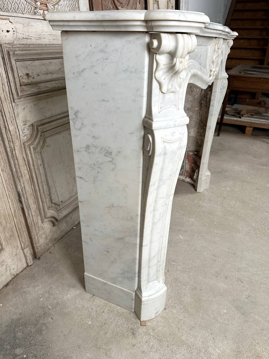 Louis XV style fireplace in white marble
