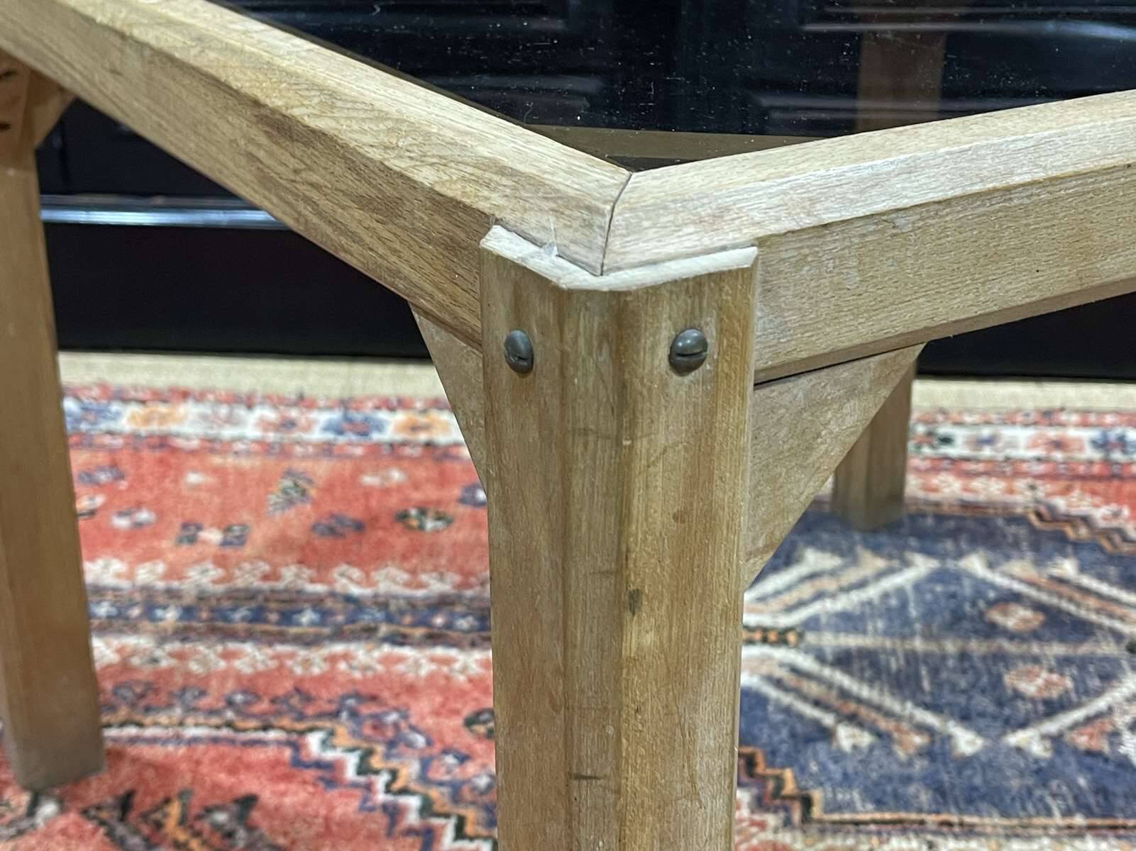 Coffee table in oak with a glass top, dating from the 1950s