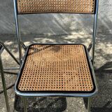 Pair of vintage metal caned folding chairs