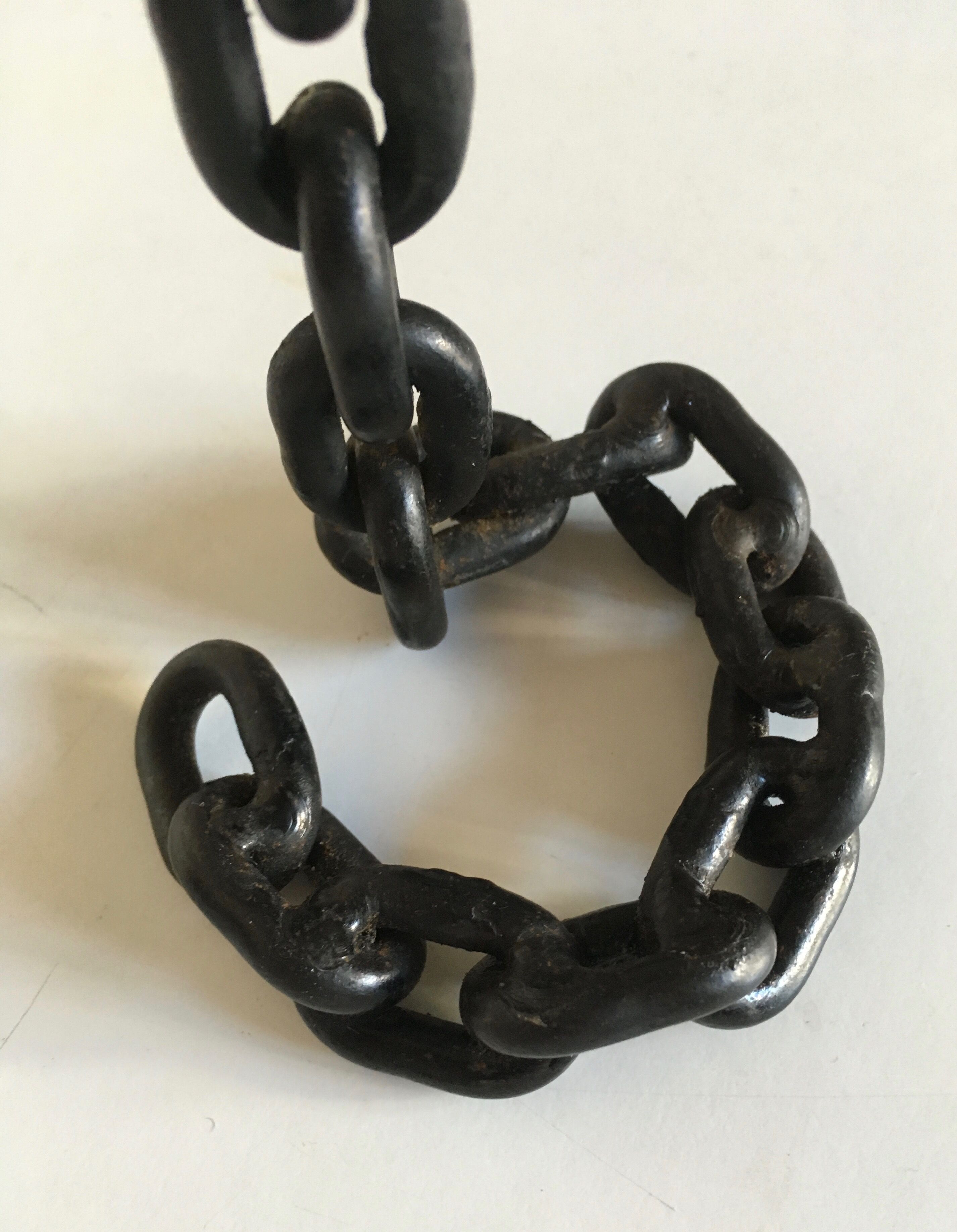 Candlestick with iron link chain and bronze cup