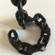 Candlestick with iron link chain and bronze cup