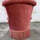 Fauteuil crapaud rose capitonné