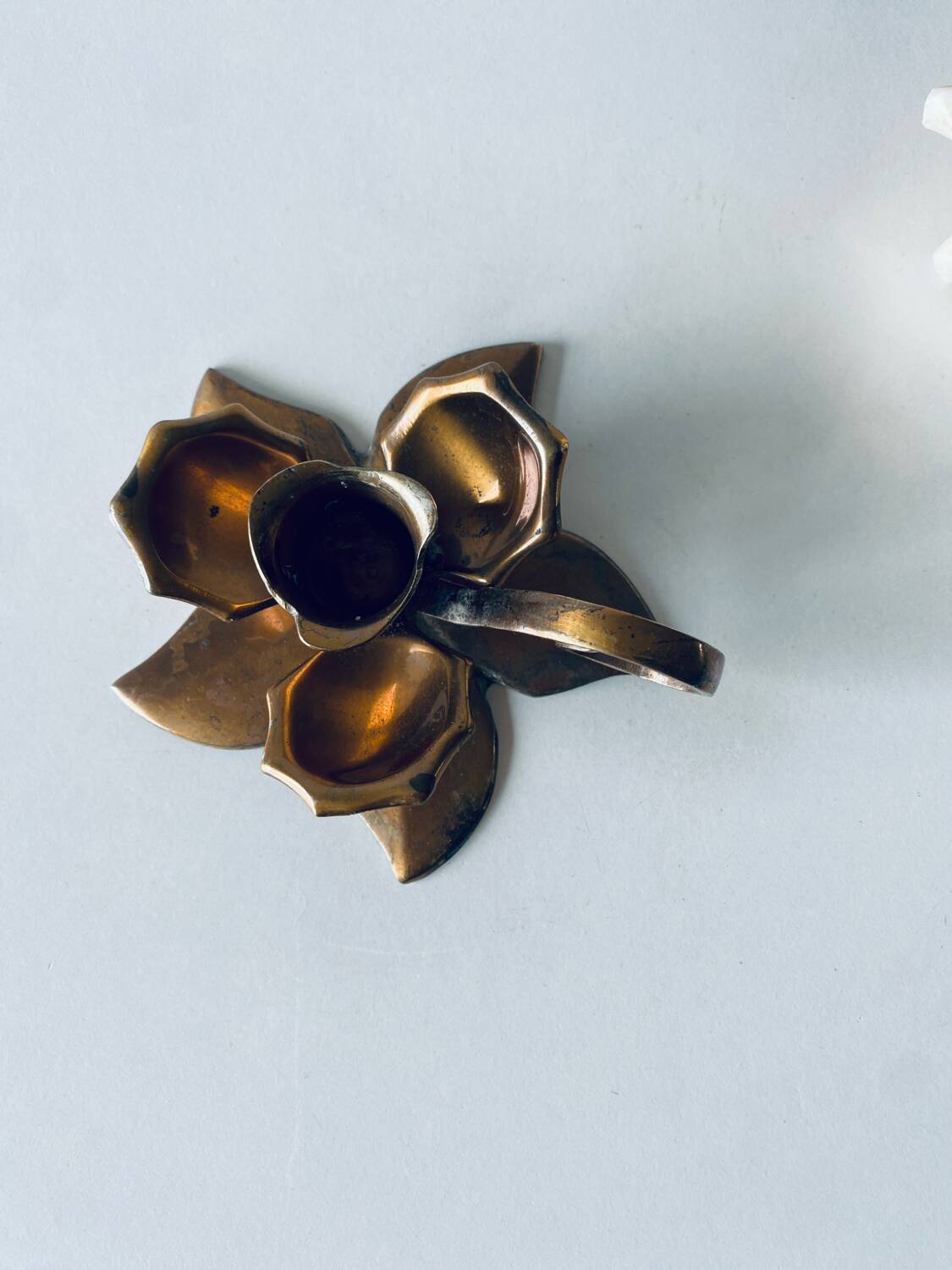 Brass flower candle holder