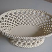 Woven ceramic oval fruit bowl or dish