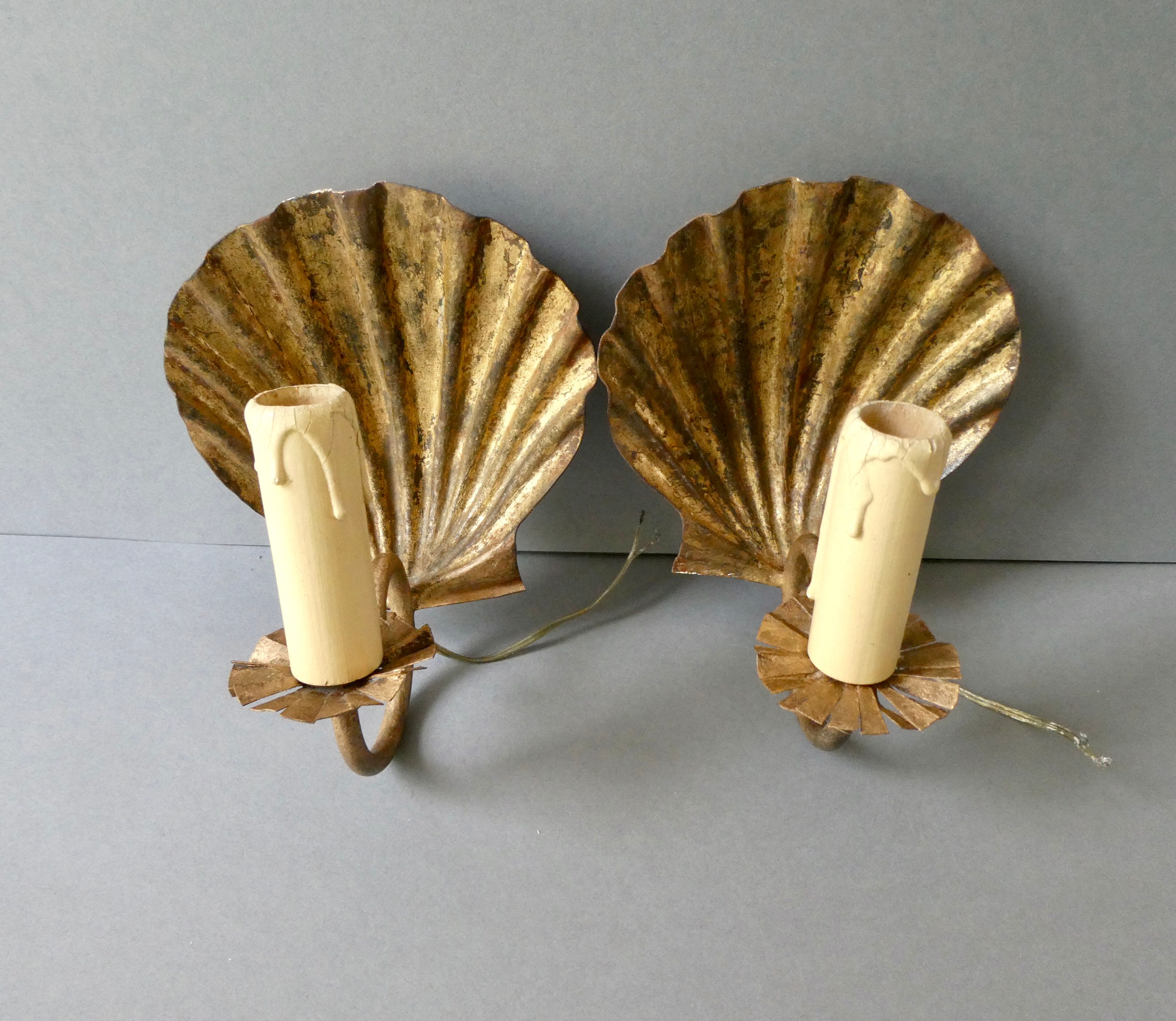 Pair of golden metal shell sconces