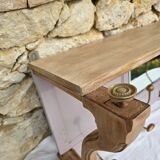 Coat rack or wall-mounted entrance wardrobe with scroll arms and antique hooks.