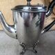 Jug or teapot with its HL Linton milk jug