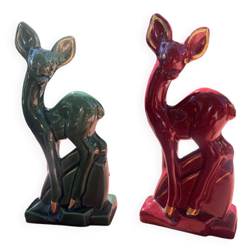 Pair of Art Deco deer by Charles Lemanceau in red and green ceramic.