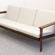 Scandinavian style three-seater sofa in teak, France circa 1950.