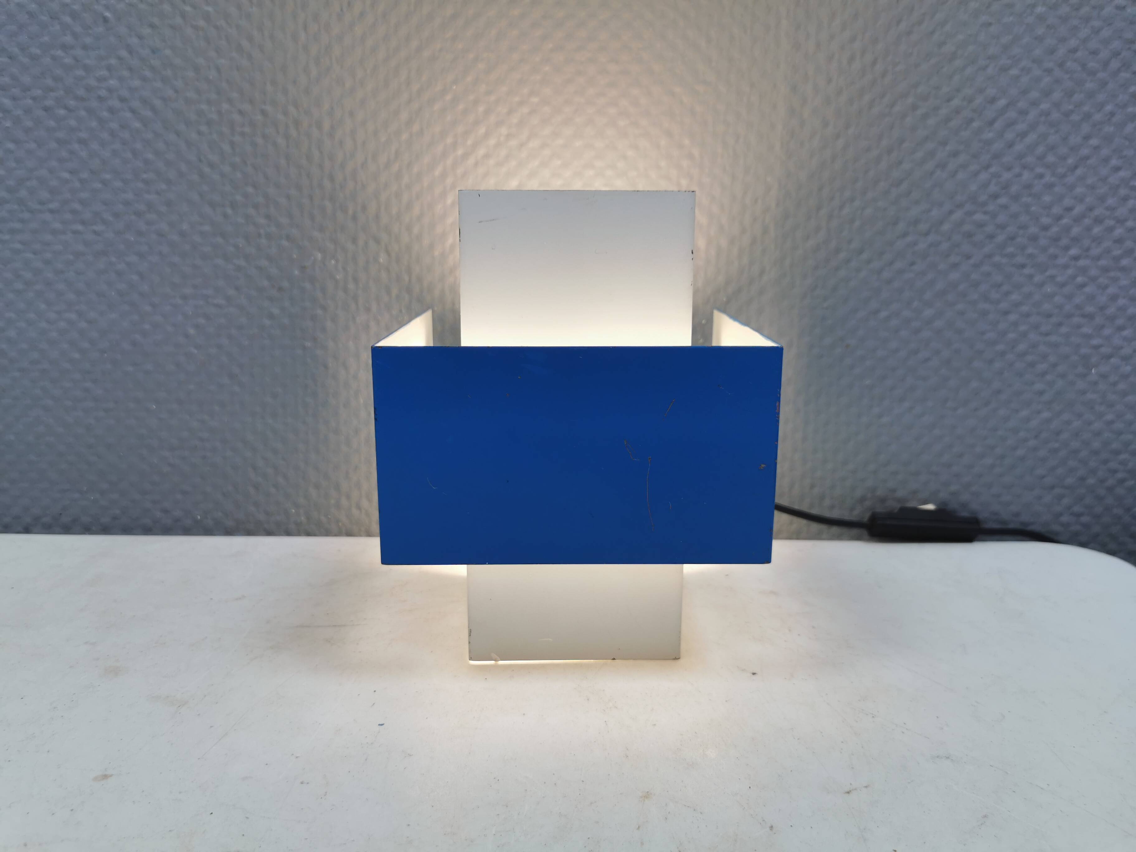 Wall lamp attributed to Louis Kalff for Phillips in the early 1960s.