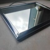 Barber mirror with chain.