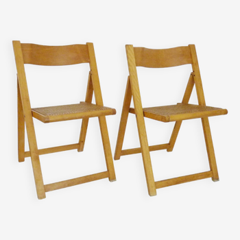 Pair of vintage folding chairs in beech and canework. Italy 70s