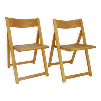Pair of vintage folding chairs in beech and canework. Italy 70s