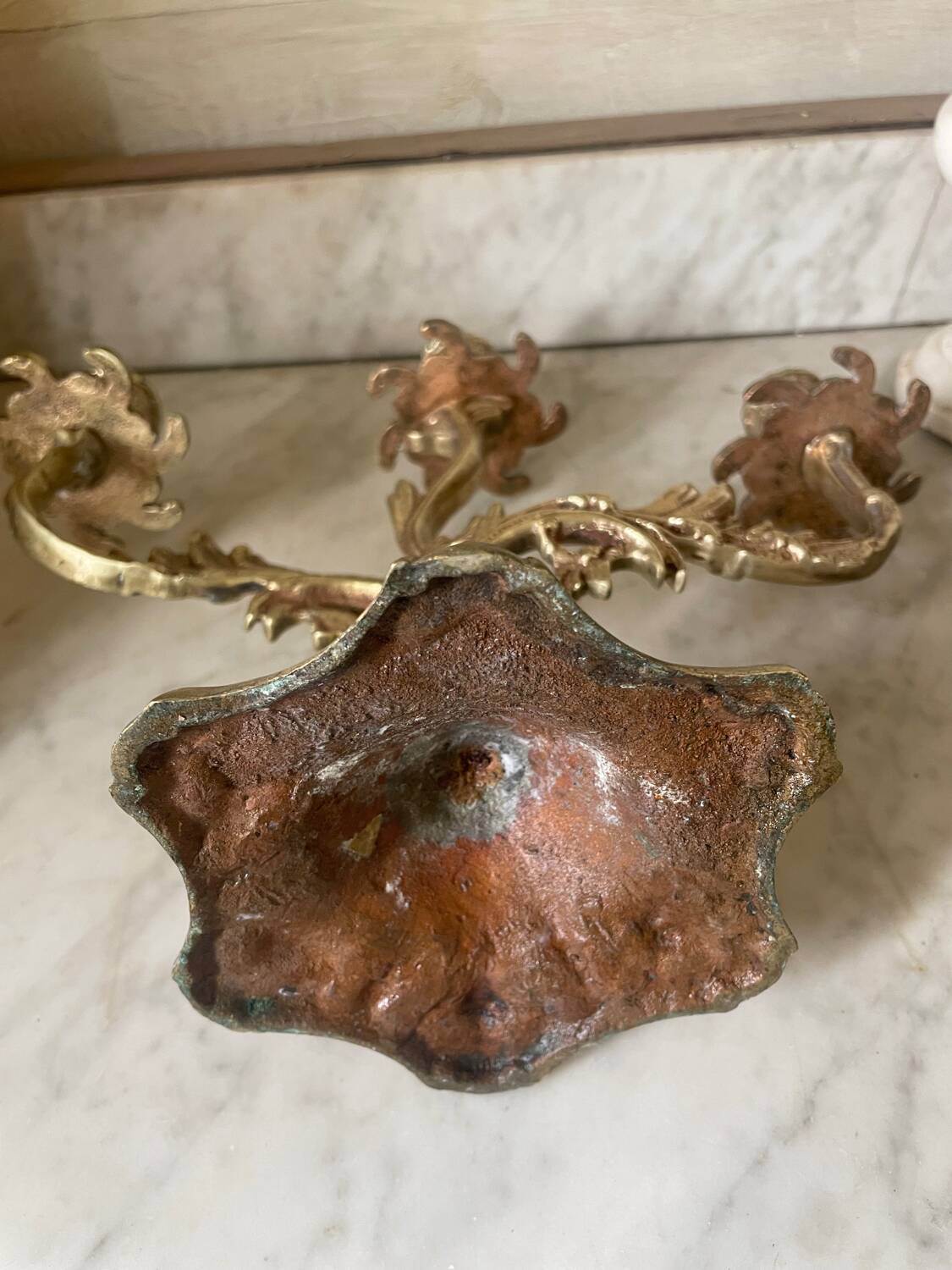 Old gilded bronze candlestick